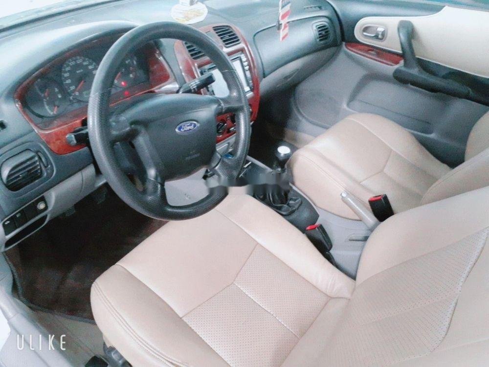 Ford Laser 2003 - Gia đình bán Ford Laser đời 2003, màu bạc