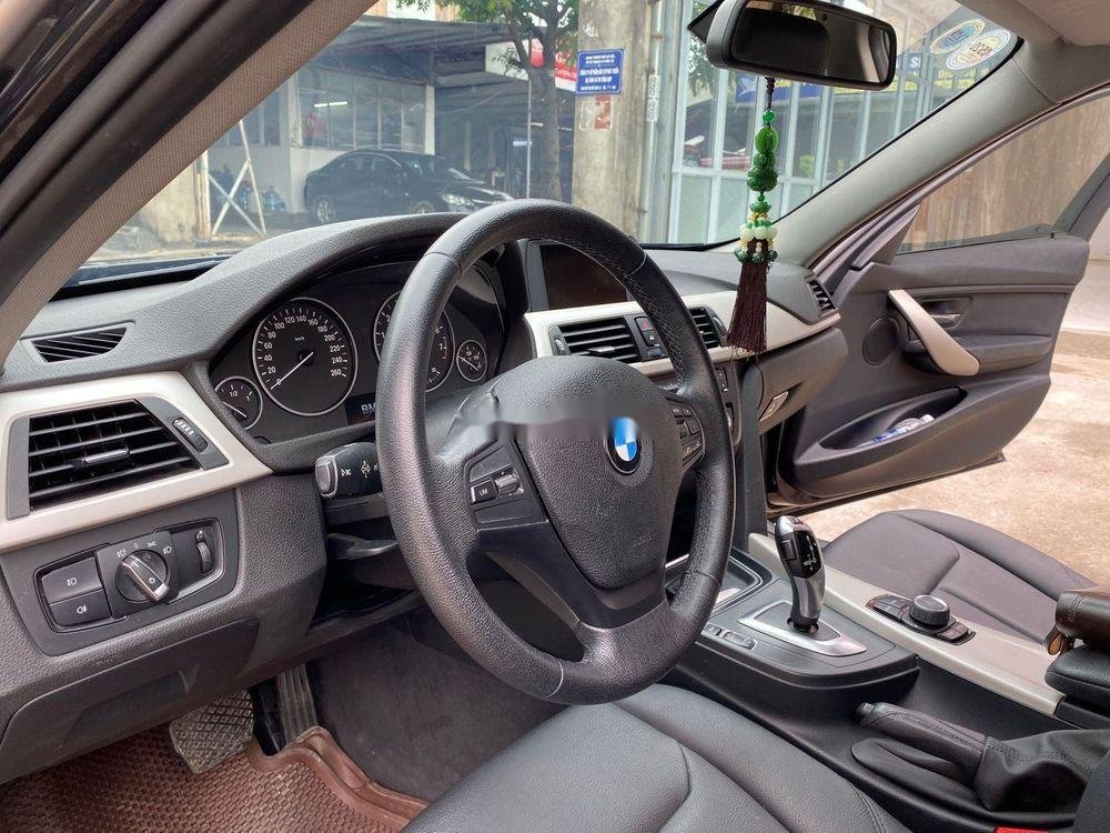 BMW 3 Series 2014 - Bán xe BMW 3 Series 320i đời 2014, màu đen