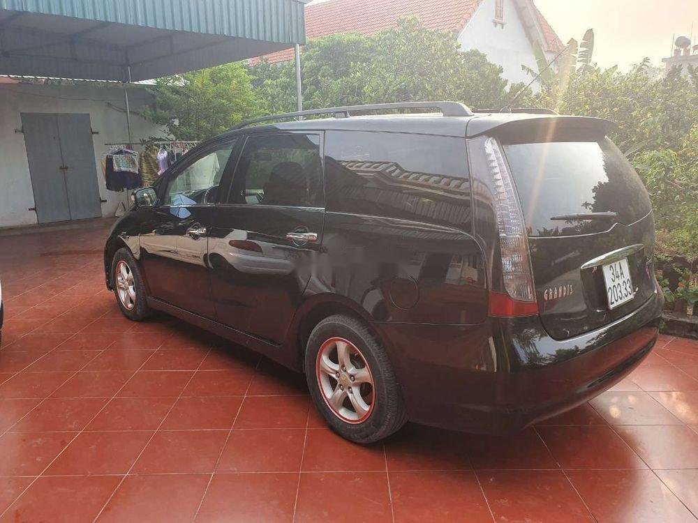 Mitsubishi Grandis 2006 - Bán xe Mitsubishi Grandis 2006, màu đen số tự động, giá tốt