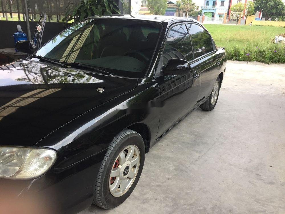 Kia Spectra 2003 - Cần bán lại xe Kia Spectra sản xuất 2003, màu đen, xe nhập chính chủ