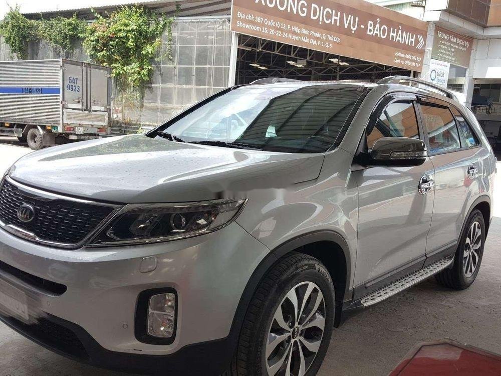 Kia Sorento 2016 - Bán xe Kia Sorento 2.4AT Gath 2016, màu bạc số tự động, giá tốt