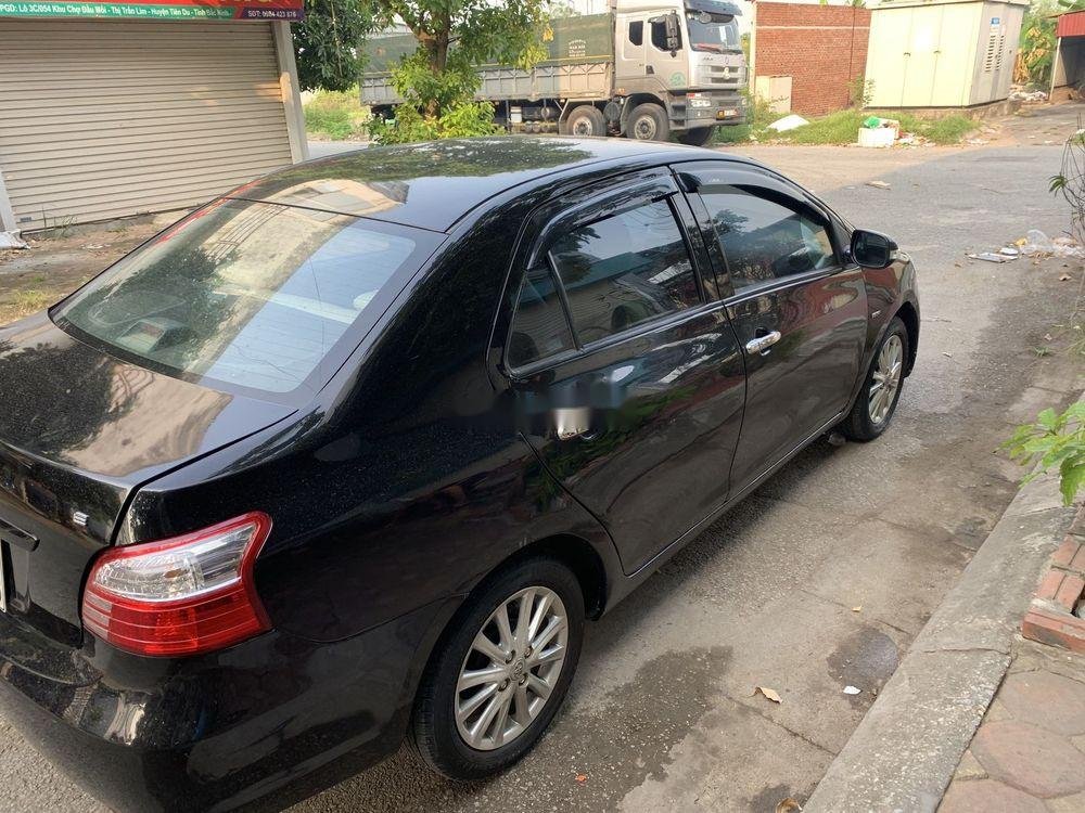 Toyota Vios 2009 - Cần bán xe Toyota Vios năm 2009, màu đen xe gia đình