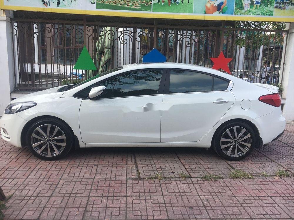 Kia K3 2015 - Bán Kia K3 1.6AT 2015 màu trắng, số tự động, giá tốt