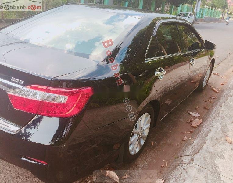 Toyota Camry 2013 - Cần bán gấp Toyota Camry 2.0E năm 2013, màu đen