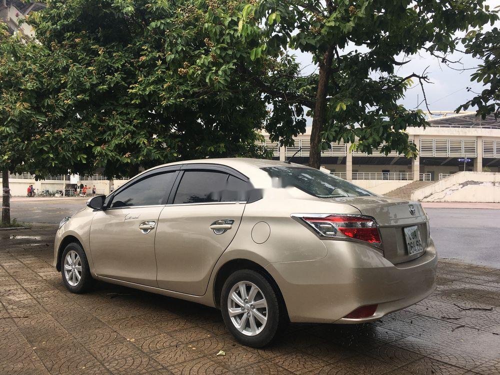 Toyota Vios 2015 - Cần bán Toyota Vios năm 2015, màu vàng, số sàn, giá cạnh tranh