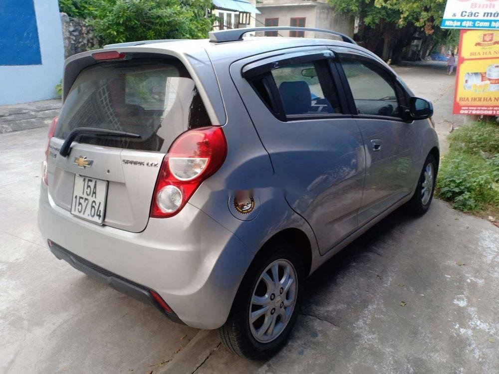 Chevrolet Spark 2013 - Bán ô tô Chevrolet Spark đời 2013, màu bạc chính chủ