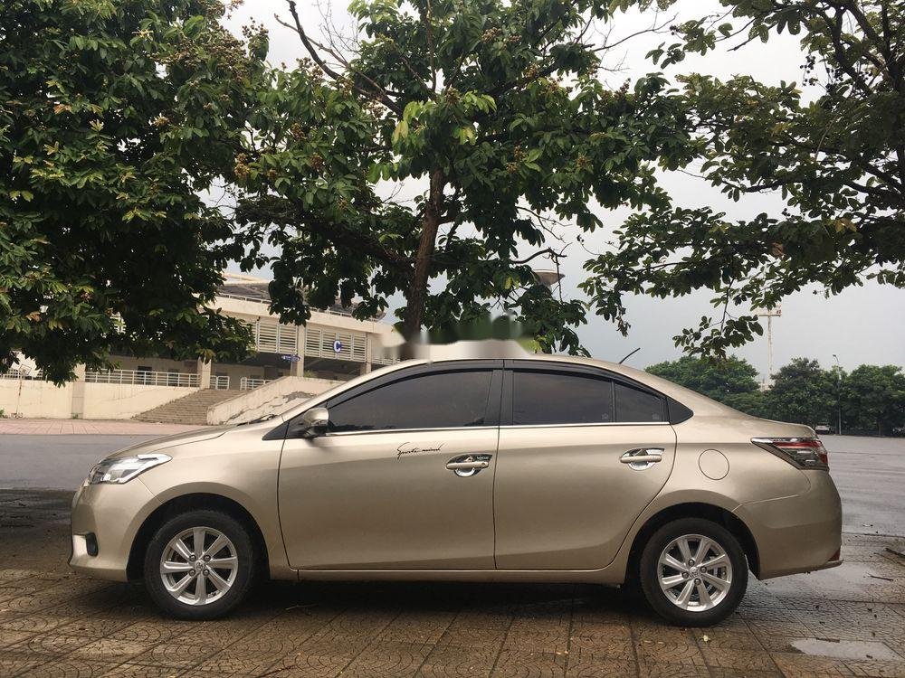 Toyota Vios 2015 - Cần bán Toyota Vios năm 2015, màu vàng, số sàn, giá cạnh tranh