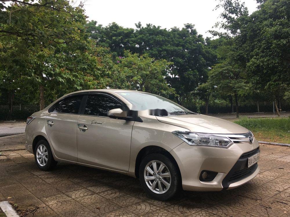 Toyota Vios 2015 - Cần bán Toyota Vios năm 2015, màu vàng, số sàn, giá cạnh tranh