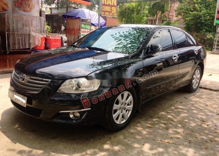 Toyota Camry 2006 - Cần bán xe Toyota Camry 2.4G đời 2006, màu đen, giá tốt