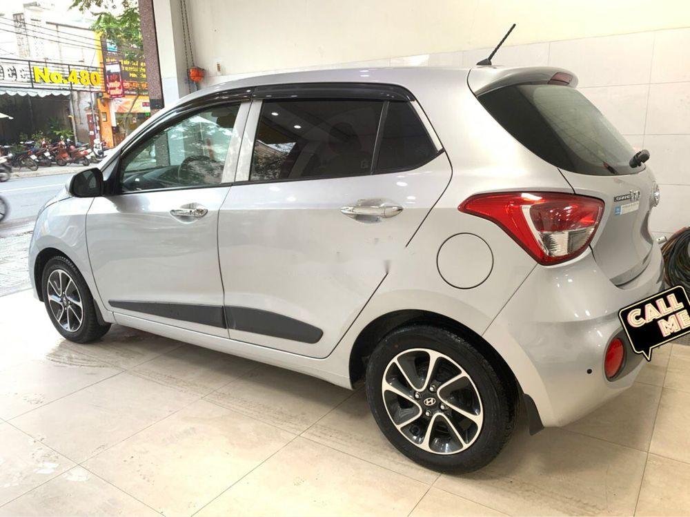 Hyundai Grand i10 2017 - Cần bán gấp Hyundai Grand i10 2017, màu bạc, còn nguyên bản