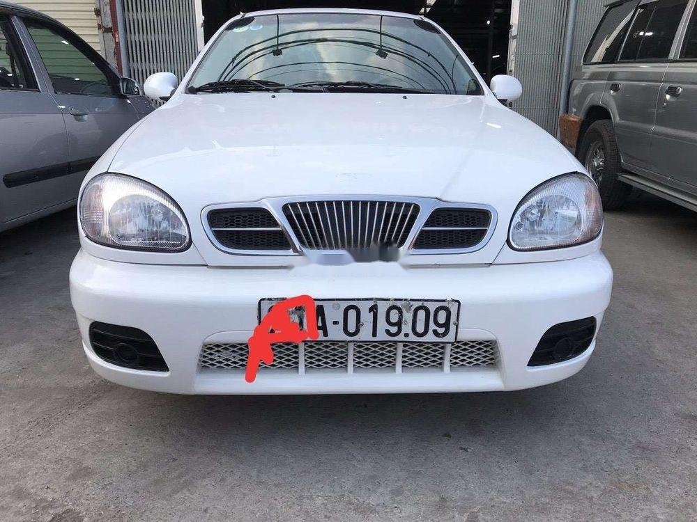 Daewoo Lanos MT 2001 - Cần bán xe Daewoo Lanos MT năm sản xuất 2001, màu trắng, nhập khẩu 