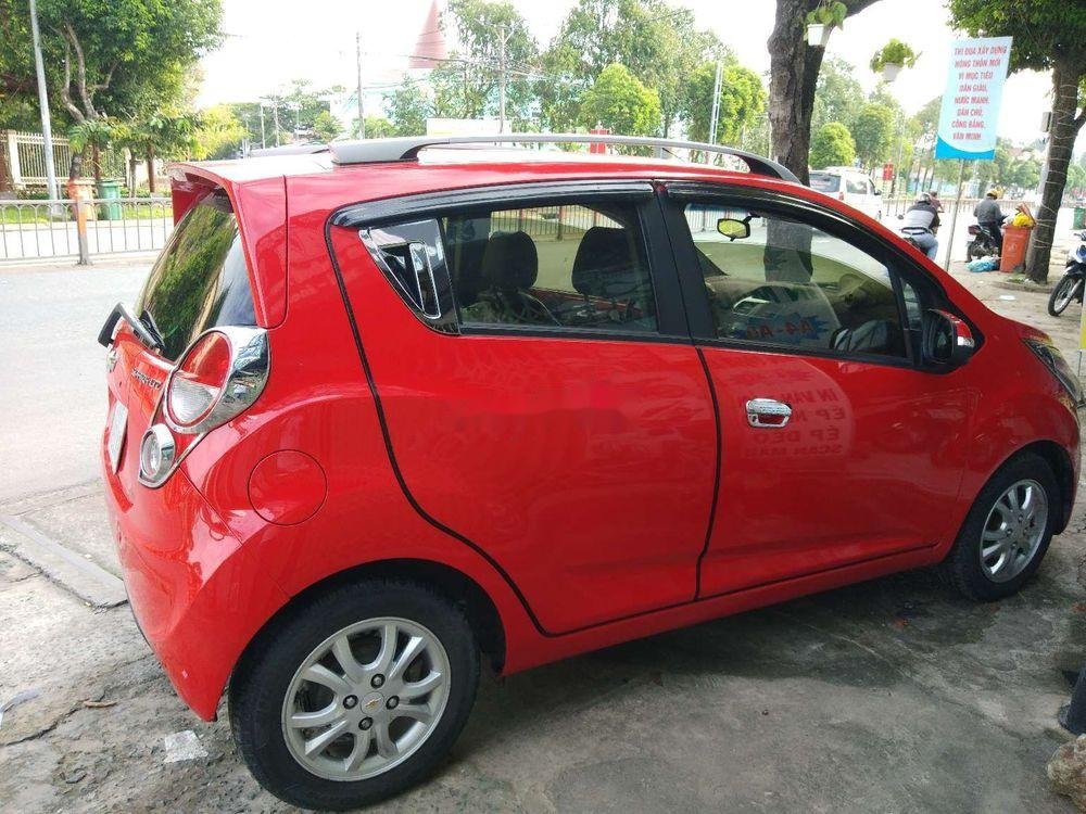 Chevrolet Spark  AT 2014 - Cần bán xe Chevrolet Spark AT sản xuất năm 2014, màu đỏ 