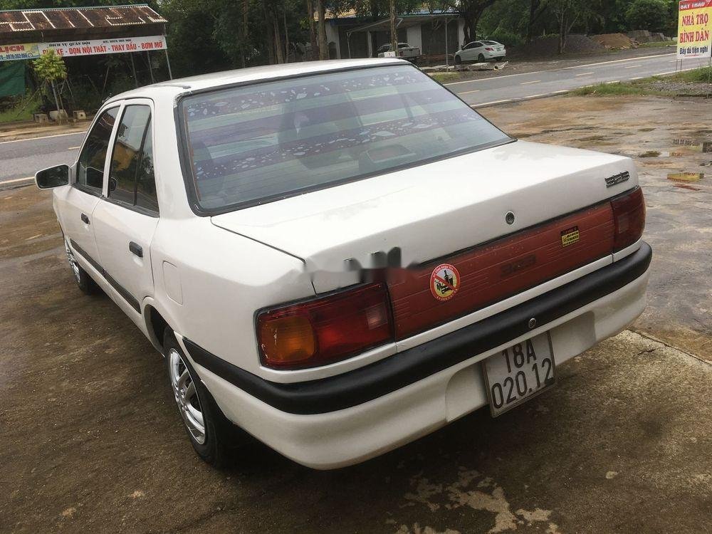 Mazda 323 1994 - Bán Mazda 323 đời 1994, màu trắng, nhập khẩu xe gia đình giá tốt