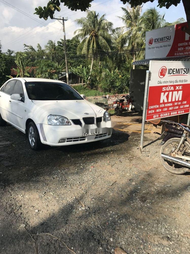 Daewoo Lacetti   1.8 2005 - Cần bán gấp Daewoo Lacetti 1.8 đời 2005, màu trắng, xe nhập giá cạnh tranh