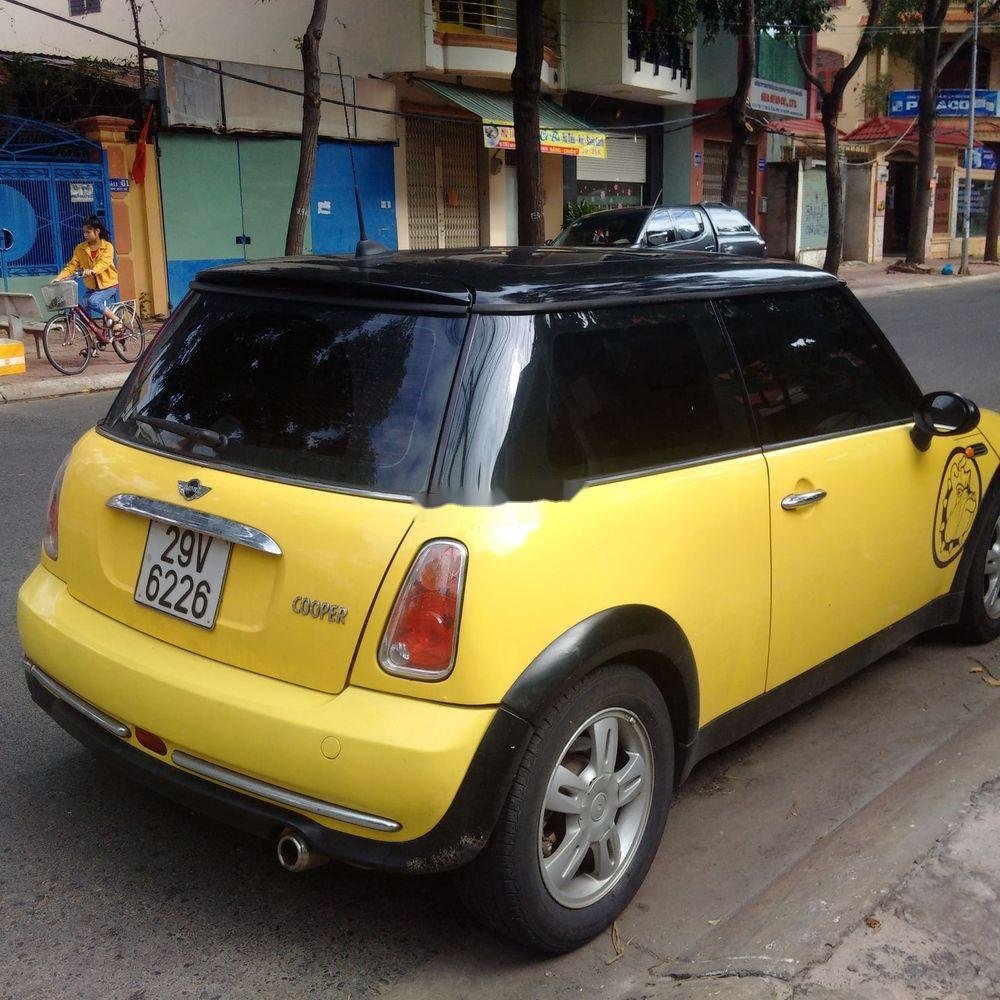 Mini Cooper 2004 - Cần bán Mini Cooper năm 2004, màu vàng chính chủ, giá 275tr, xe nguyên bản