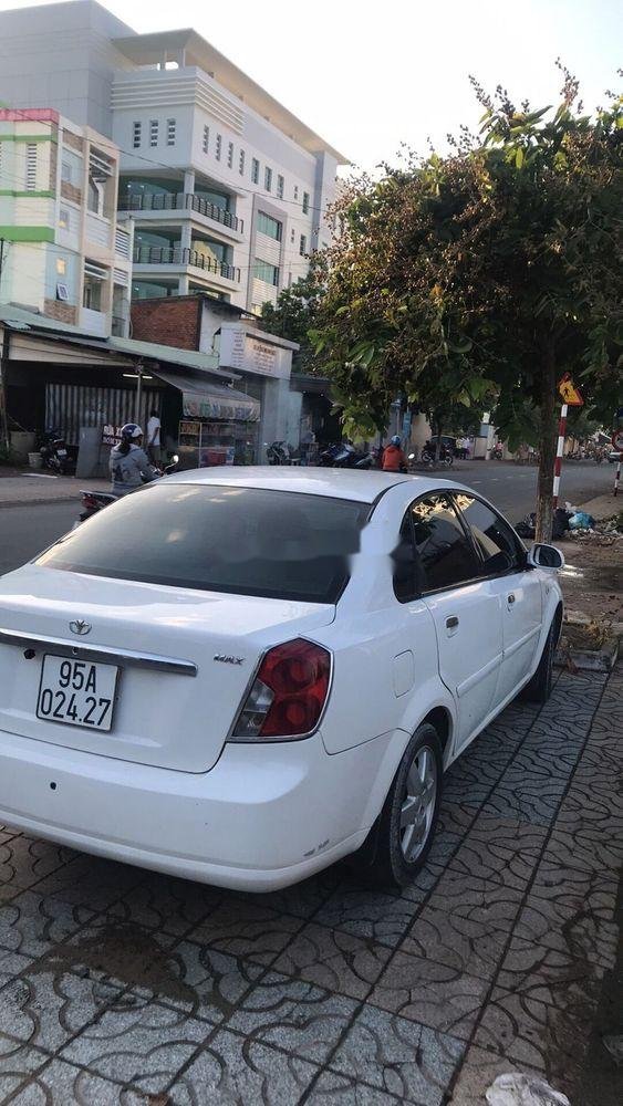 Daewoo Lacetti   1.8 2005 - Cần bán gấp Daewoo Lacetti 1.8 đời 2005, màu trắng, xe nhập giá cạnh tranh