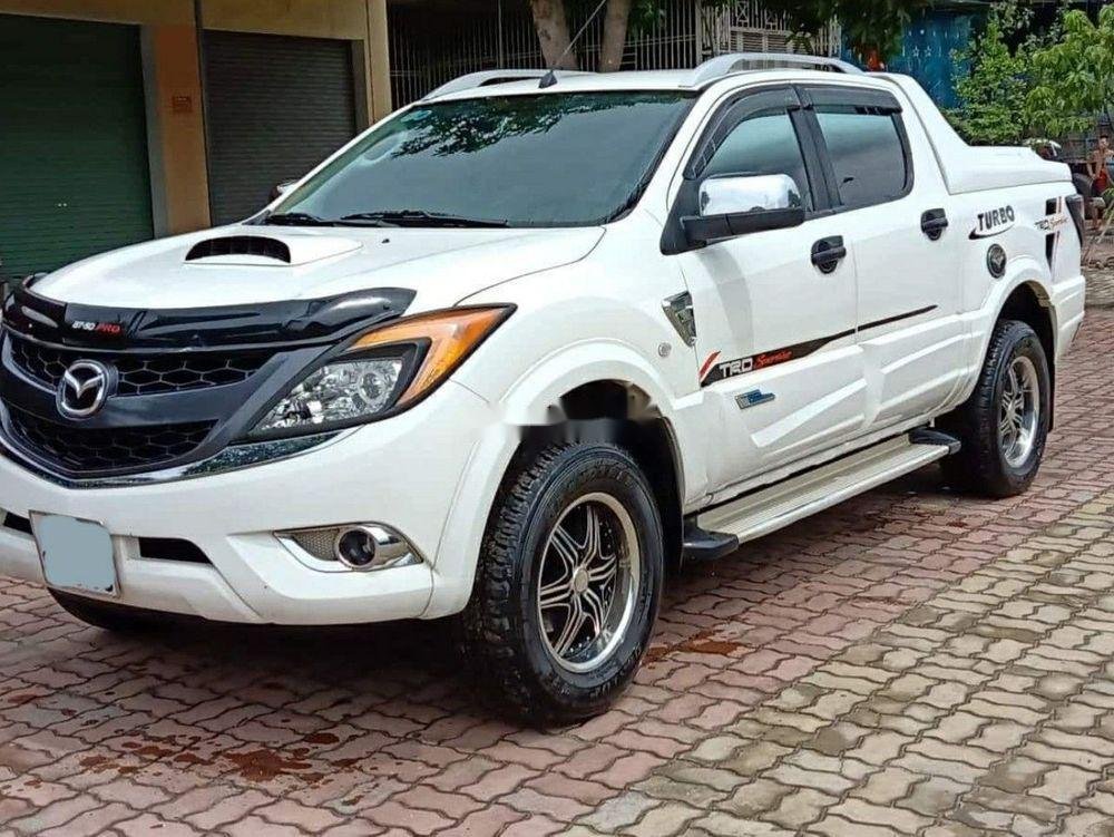 Mazda BT 50 2014 - Bán Mazda BT 50 bản sport 2.2 năm sản xuất 2014, màu trắng số sàn