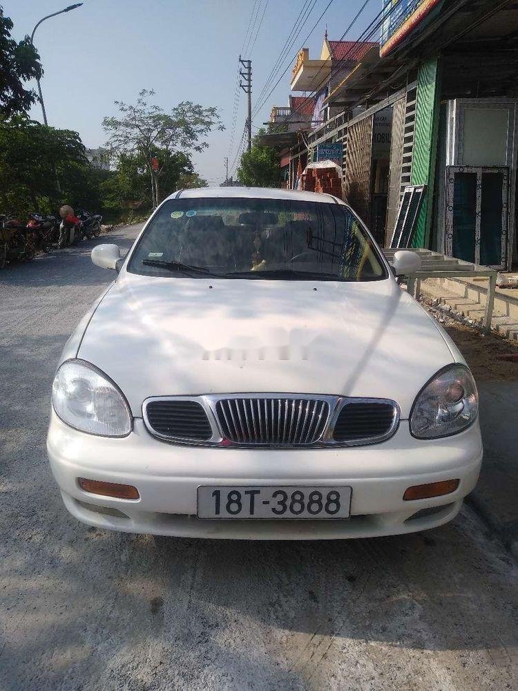 Daewoo Leganza MT 2000 - Cần bán xe Daewoo Leganza MT đời 2000, màu trắng, giá chỉ 58 triệu