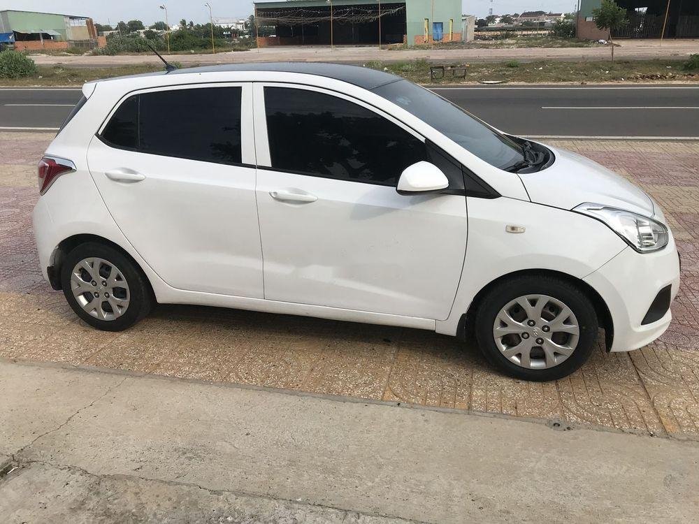 Hyundai Grand i10    MT 2014 - Cần bán Hyundai Grand i10 MT sản xuất 2014, màu trắng, nhập khẩu xe gia đình