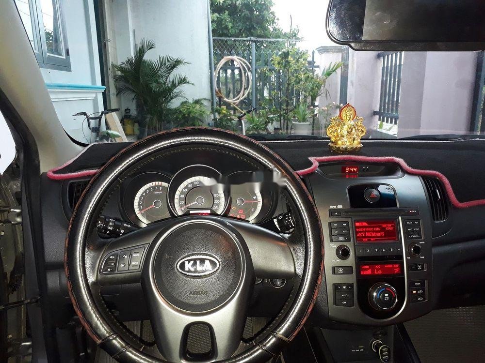 Kia Forte   MT 2010 - Bán ô tô Kia Forte MT năm sản xuất 2010, màu xám, giá tốt