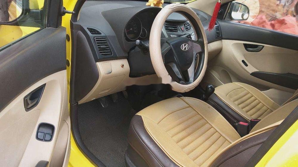 Hyundai Eon    2013 - Xe Hyundai Eon đời 2013, màu vàng, xe nhập