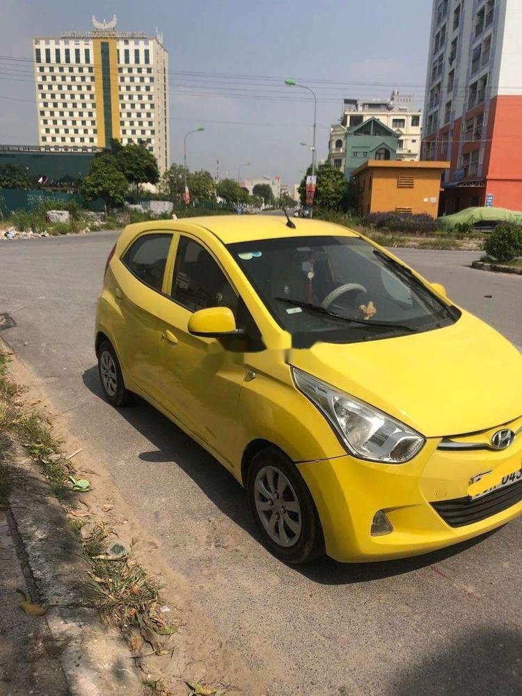 Hyundai Eon    2013 - Xe Hyundai Eon đời 2013, màu vàng, xe nhập