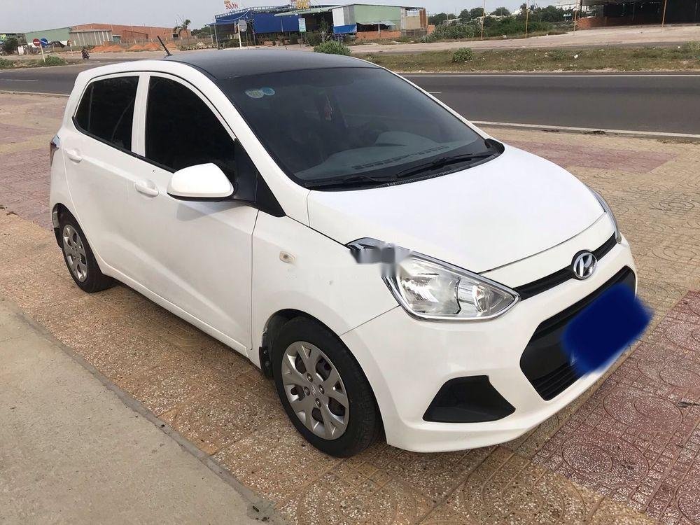 Hyundai Grand i10    MT 2014 - Cần bán Hyundai Grand i10 MT sản xuất 2014, màu trắng, nhập khẩu xe gia đình