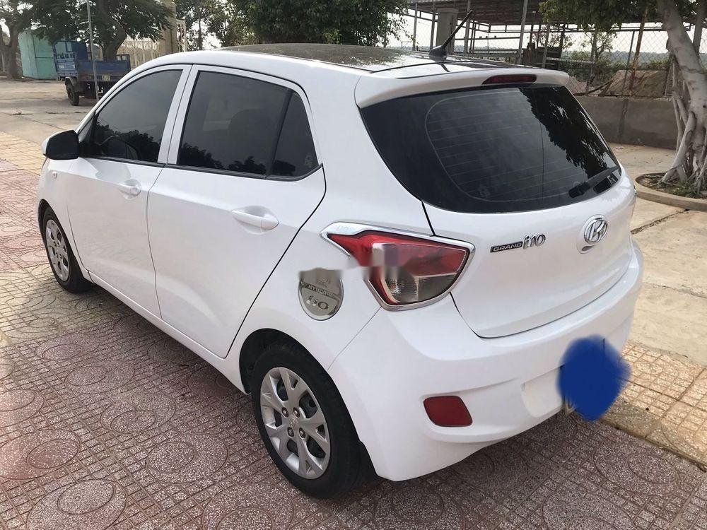 Hyundai Grand i10    MT 2014 - Cần bán Hyundai Grand i10 MT sản xuất 2014, màu trắng, nhập khẩu xe gia đình