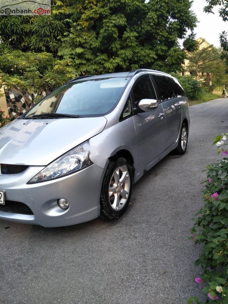 Mitsubishi Grandis 2.4 AT 2010 - Cần bán Mitsubishi Grandis 2.4 AT 2010, màu bạc chính chủ