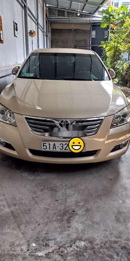 Toyota Camry    2007 - Bán Toyota Camry đời 2007, màu vàng, xe nhập còn mới