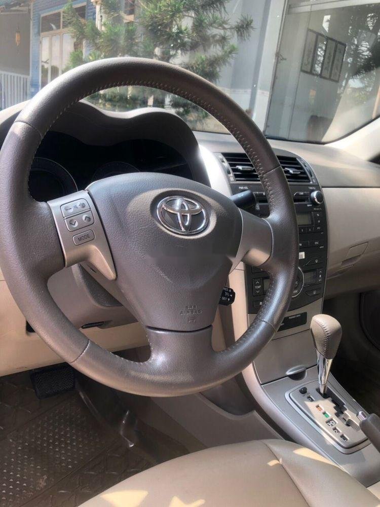 Toyota Corolla   2010 - Cần bán Toyota Corolla đời 2010, màu đen, nhập khẩu nguyên chiếc