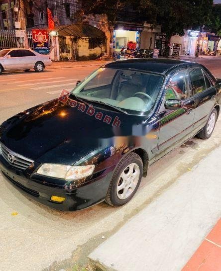 Mazda 626    2004 - Cần bán lại xe Mazda 626 sản xuất năm 2004, 215 triệu