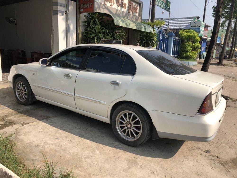 Daewoo Magnus   2004 - Bán Daewoo Magnus sản xuất 2004, màu trắng, xe nhập, số tự động 