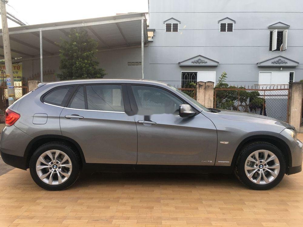 BMW X1   2010 - Cần bán xe BMW X1 sản xuất 2010, màu xám, nhập khẩu