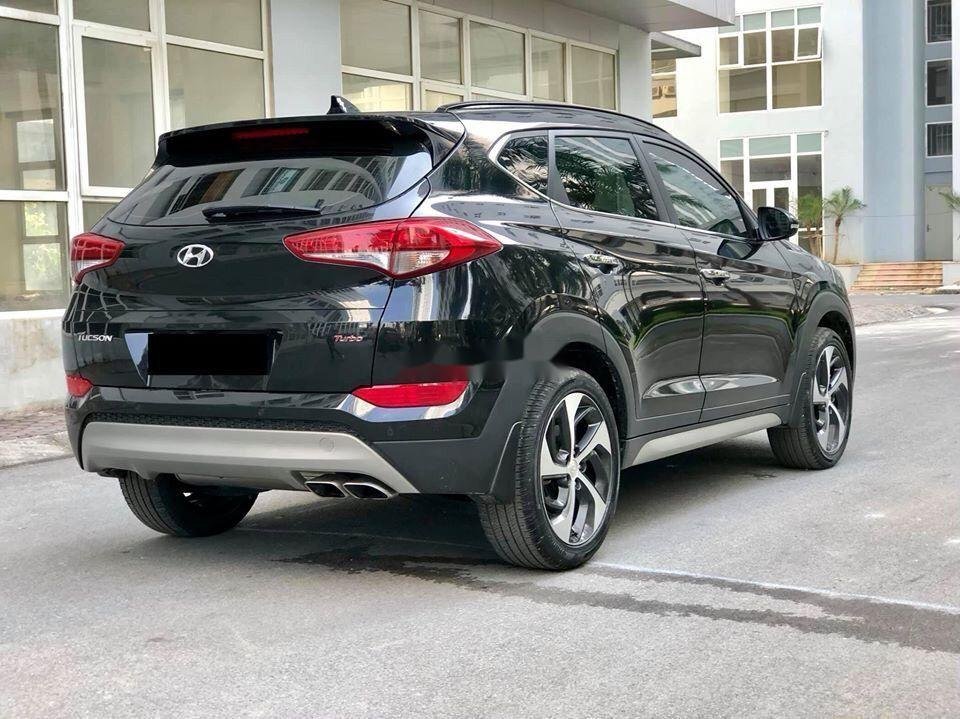 Hyundai Tucson   2018 - Cần bán Hyundai Tucson đời 2018, màu đen còn mới, giá tốt