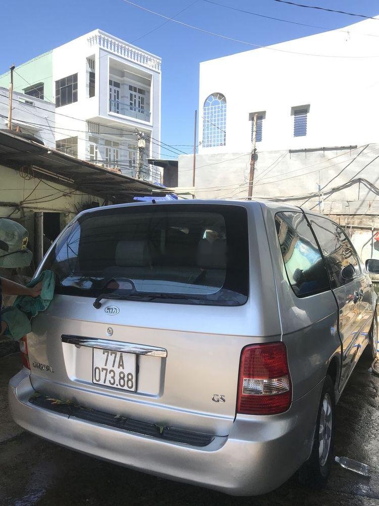 Kia Carnival 2008 - Cần bán Kia Carnival 2008, màu bạc xe nguyên bản