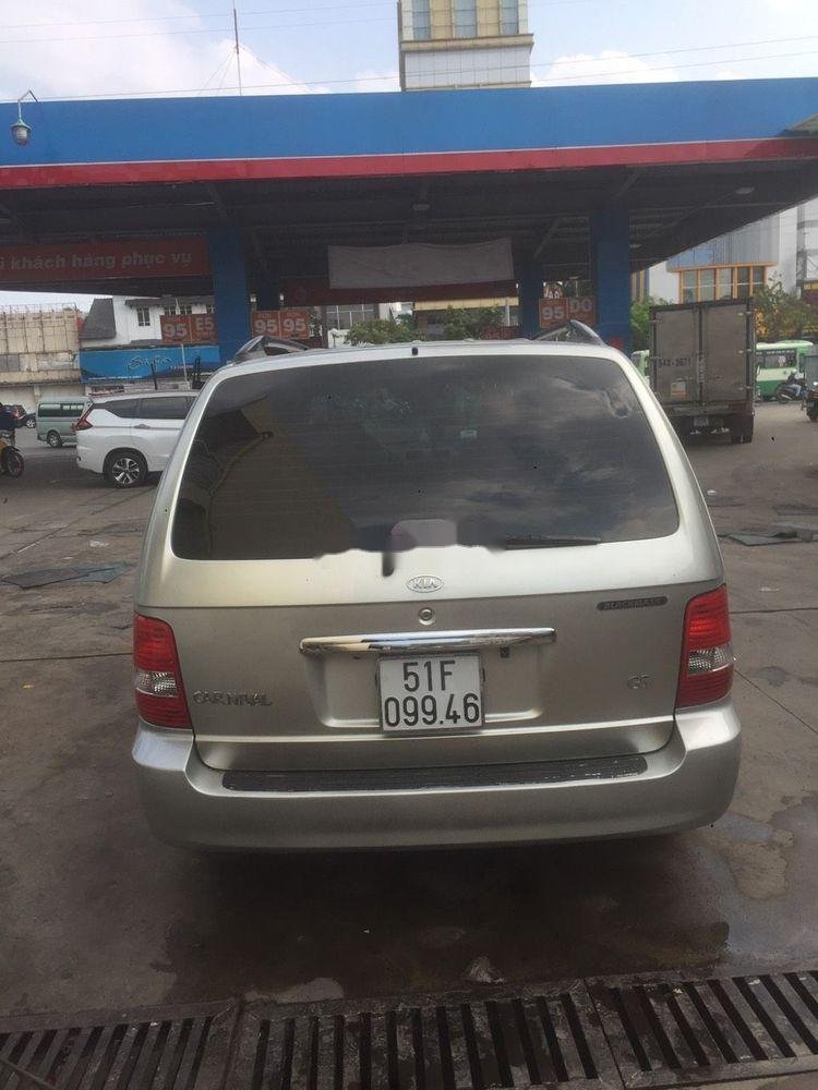 Kia Carnival 2009 - Bán xe Kia Carnival 2009, màu bạc, nhập khẩu nguyên chiếc chính hãng