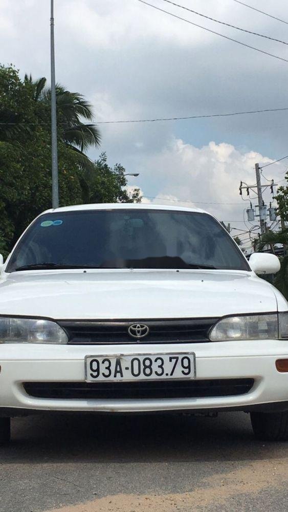 Toyota Corolla   1995 - Cần bán Toyota Corolla sản xuất năm 1995, màu trắng