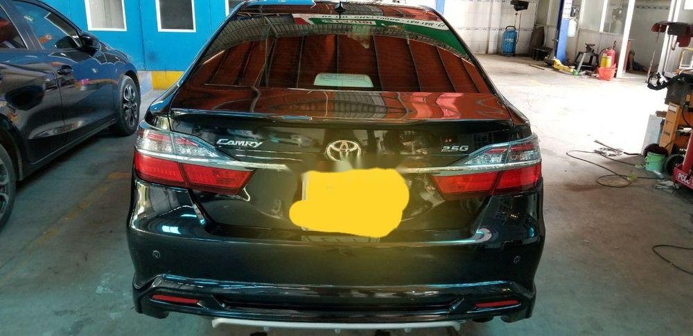 Toyota Camry 2016 - Cần bán gấp Toyota Camry đời 2016, màu đen xe nguyên bản