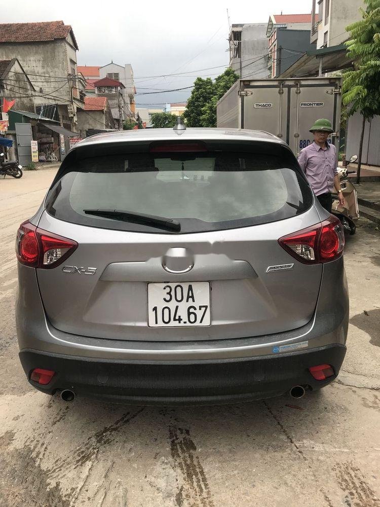 Mazda CX 5 2014 - Bán Mazda CX 5 đời 2014, màu bạc xe nguyên bản