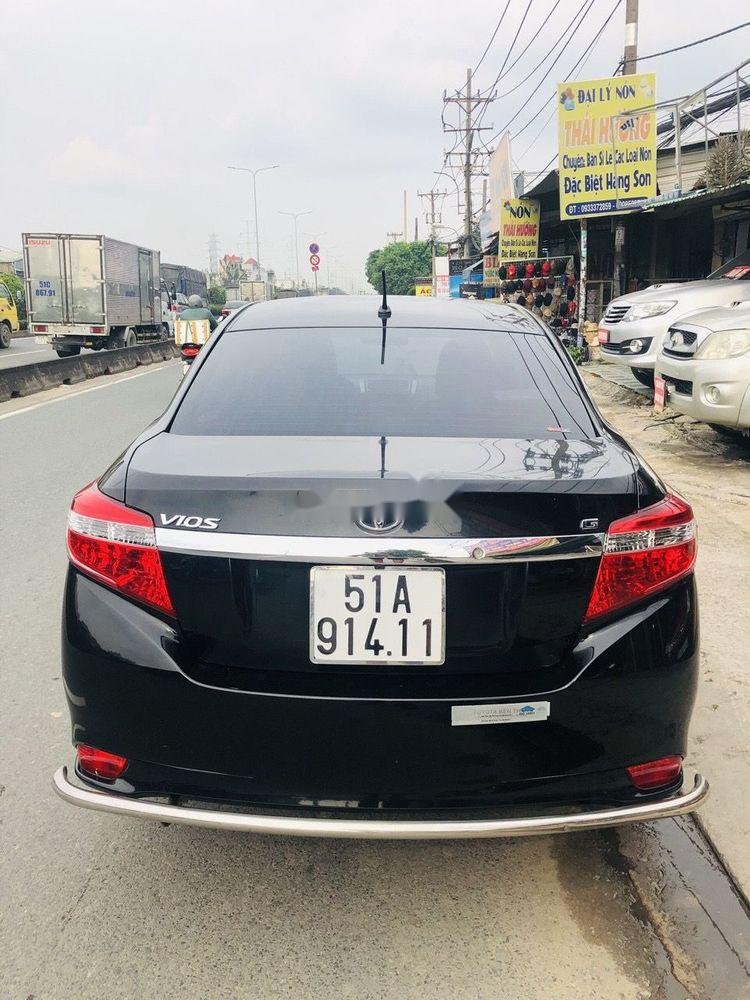 Toyota Vios 2014 - Bán Toyota Vios 1.5G 2014, màu đen chính chủ, giá tốt