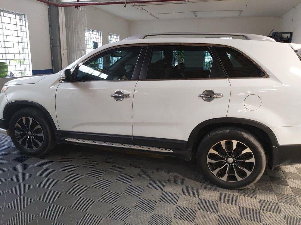 Kia Sorento 2014 - Cần bán xe Kia Sorento năm sản xuất 2014, màu trắng đã đi 70.000 km