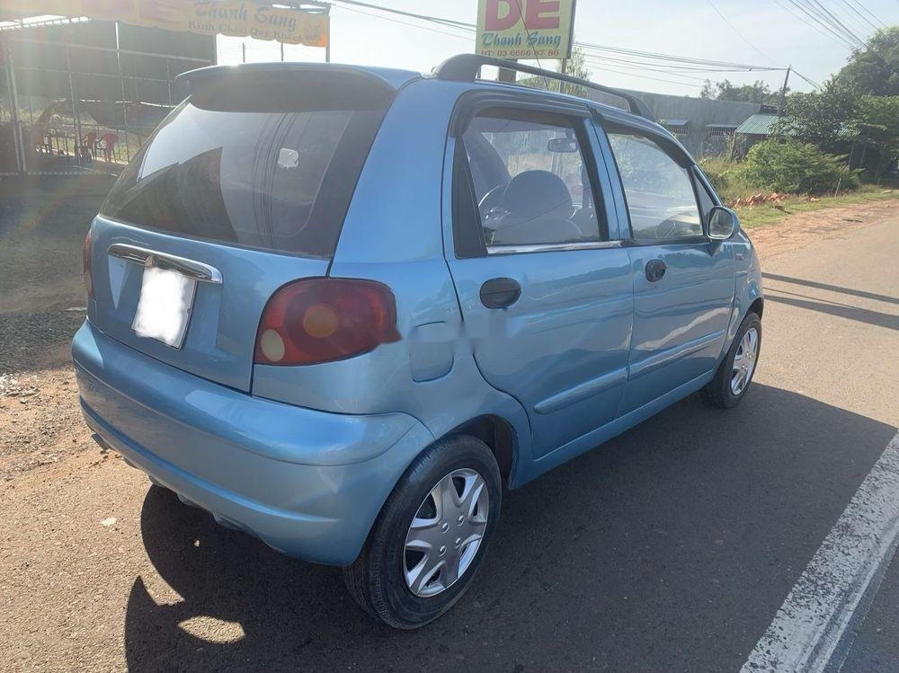 Daewoo Matiz 2004 - Xe Daewoo Matiz đời 2004, màu xanh lam xe nguyên bản