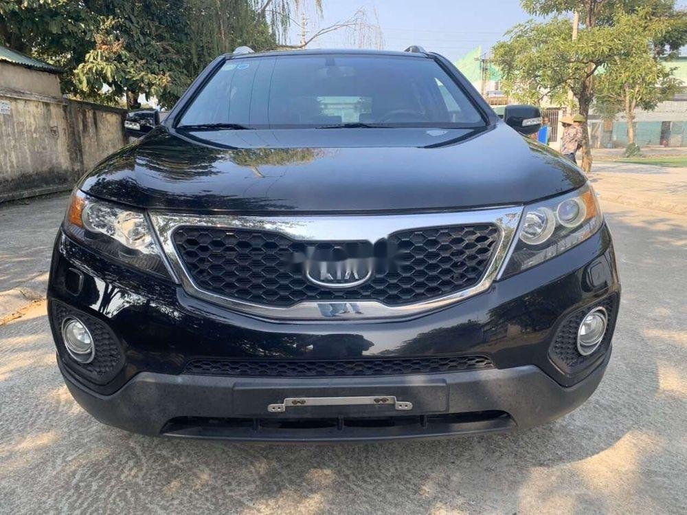 Kia Sorento 2012 - Cần bán lại xe Kia Sorento 2.4 AT đời 2012, màu đen số tự động