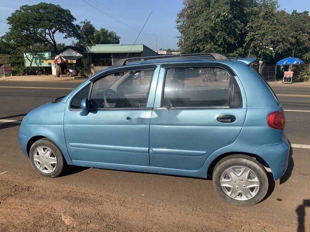 Daewoo Matiz 2004 - Xe Daewoo Matiz đời 2004, màu xanh lam xe nguyên bản