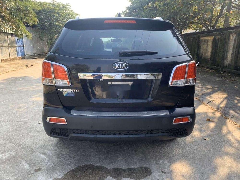 Kia Sorento 2012 - Cần bán lại xe Kia Sorento 2.4 AT đời 2012, màu đen số tự động