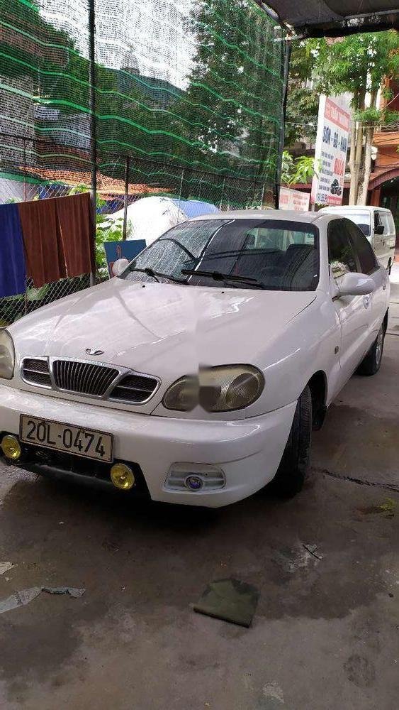 Daewoo Lanos   2002 - Cần bán lại xe Daewoo Lanos sản xuất năm 2002, màu trắng