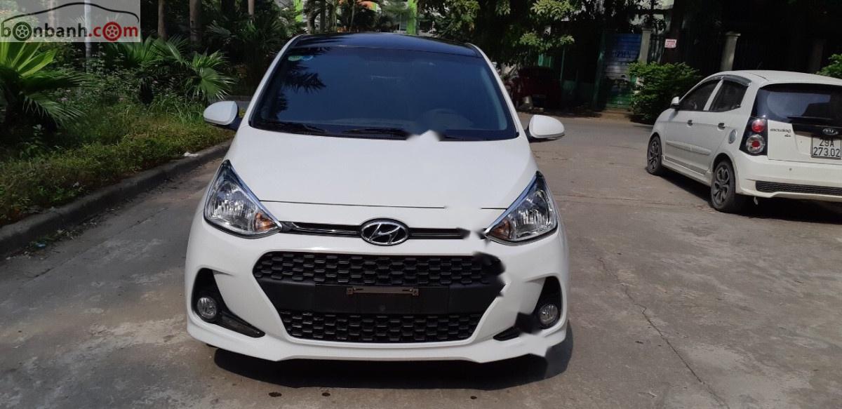 Hyundai Grand i10 2018 - Cần bán xe Hyundai Grand i10 1.2 sản xuất 2018, màu trắng chính chủ