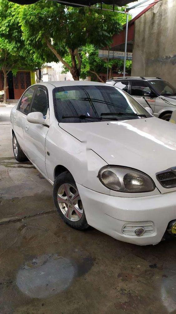 Daewoo Lanos   2002 - Cần bán lại xe Daewoo Lanos sản xuất năm 2002, màu trắng