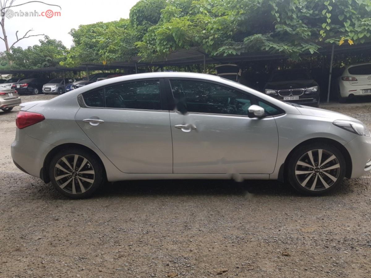 Kia K3 2014 - Cần bán lại xe Kia K3 2.0AT 2014, màu bạc, 477tr